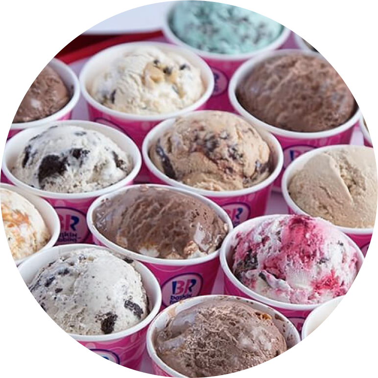 Assorted baskin-robbins ice cream flavors in small cups arranged on a table.